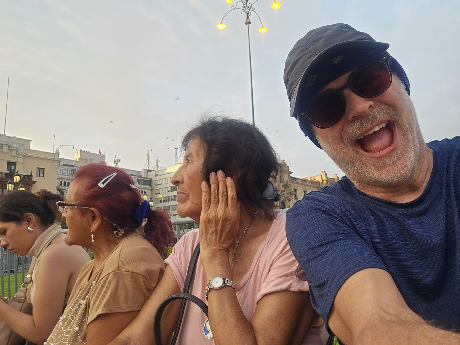 A banner for the Lima Pisco Sour Festival, a close-up of a Pisco Sour drink, and two selfies of the author enjoying the festival atmosphere with crowds in the background.