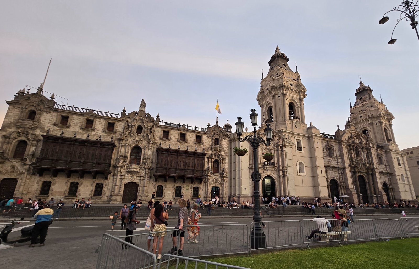 Views of the grand colonial architecture and bustling squares in Lima's Centro Historico, including the Cathedral and Government Palace.