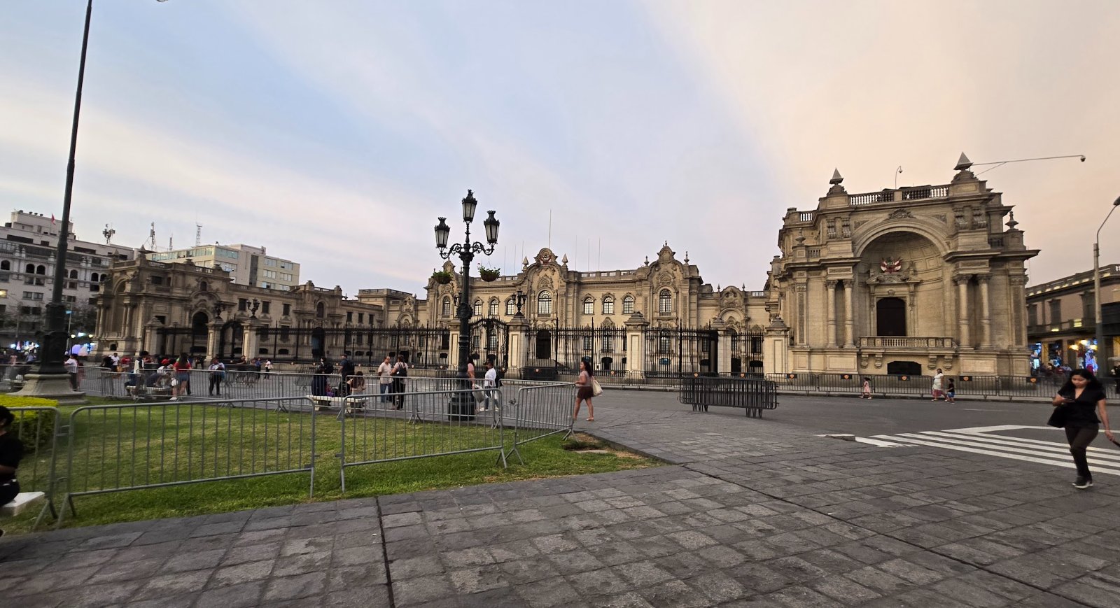 Views of the grand colonial architecture and bustling squares in Lima's Centro Historico, including the Cathedral and Government Palace.