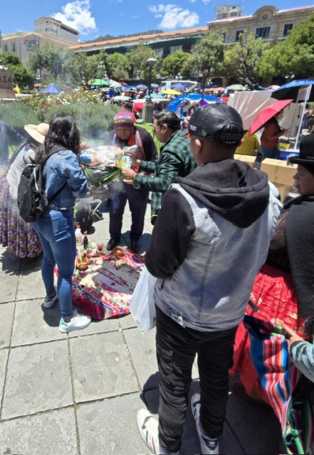 Shaman performing ceremonial blessing with smoke at the Festival of Abundance