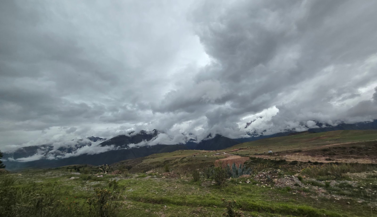 Ancient Inca structures built into the side of a mountain