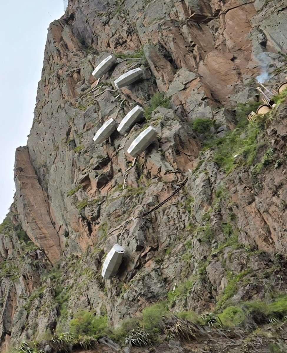 A row of colorful mototaxis parked on a street in Pisaq